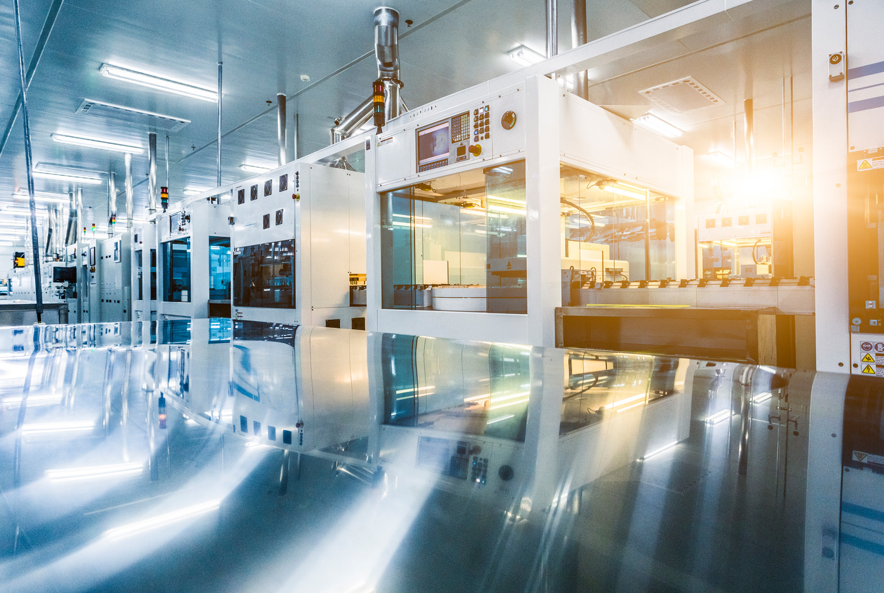 Smiling senior scientist with her colleagues in laboratory Smiling senior scientist with her colleagues in laboratory